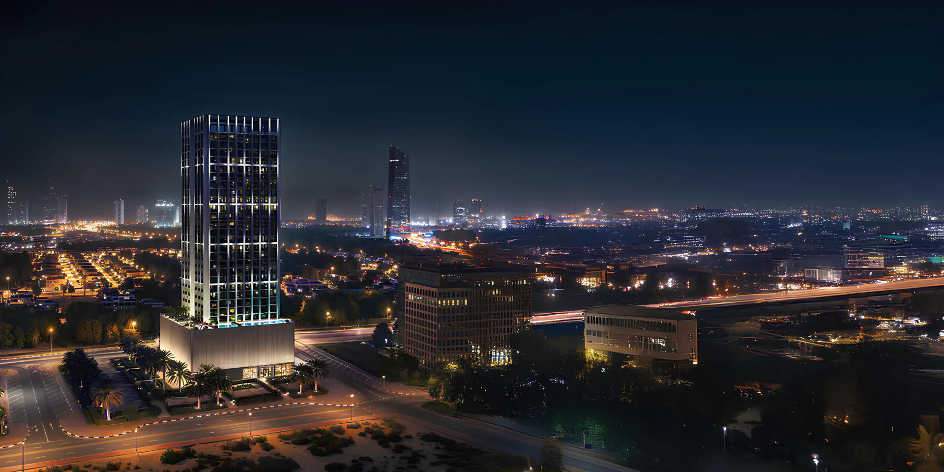 Binghatti Etherea – apšviestas gyvenamasis bokštas naktinėje Dubajaus panoramoje