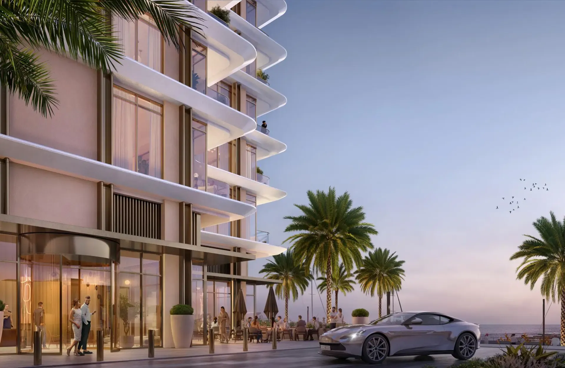 Marina Views – bokšto fasadas su apvaliais balkonais ir įėjimas pakrantėje